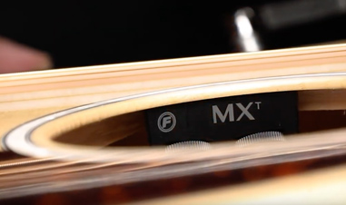 closeup of Fishman electronics inside acoustic guitar