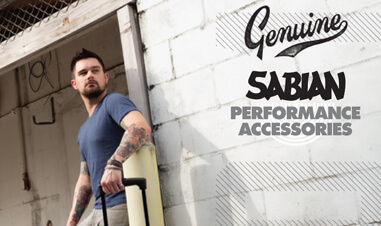 man leaning against wall with with Sabian symbols case in Sabian advertisement